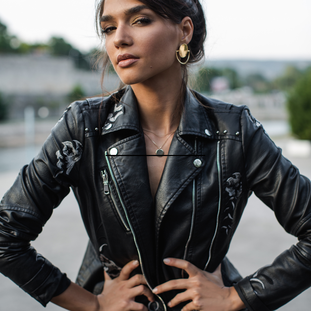 Elegant leather jacket styles enhancing brand image and personal style in a photoshoot setting.