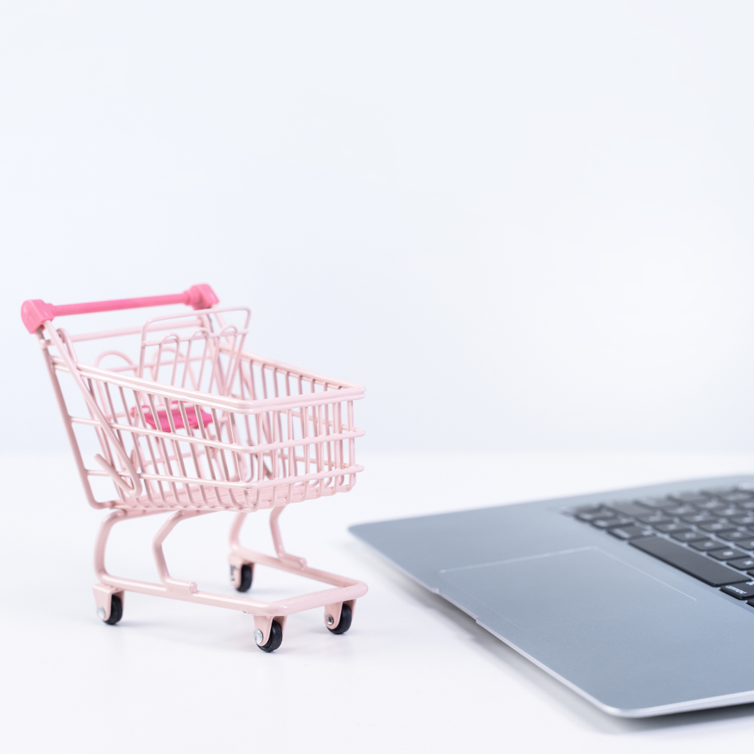 Online shopping cart with an upward arrow representing growth