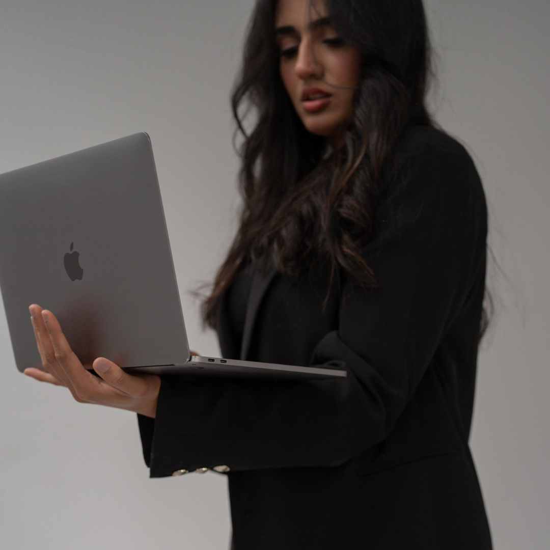 Modern website design layout on a laptop showcasing strategic design elements that help service-based businesses increase sales and conversions